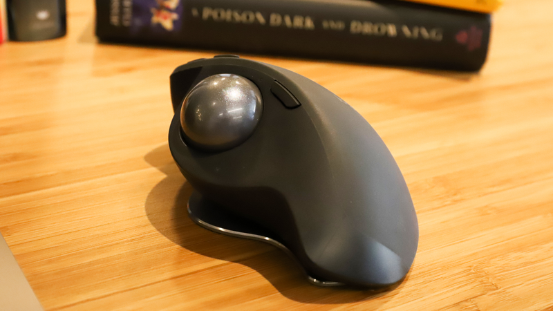 The button next to the ball is for quick sensitivity adjustment.